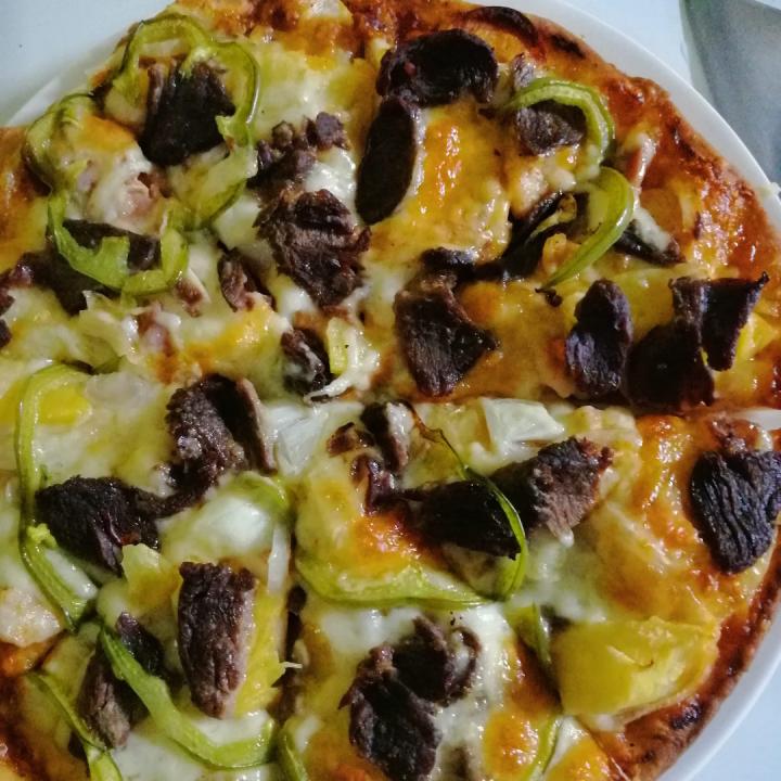 Beef Pizza from Birds Nest Kampot TukOut